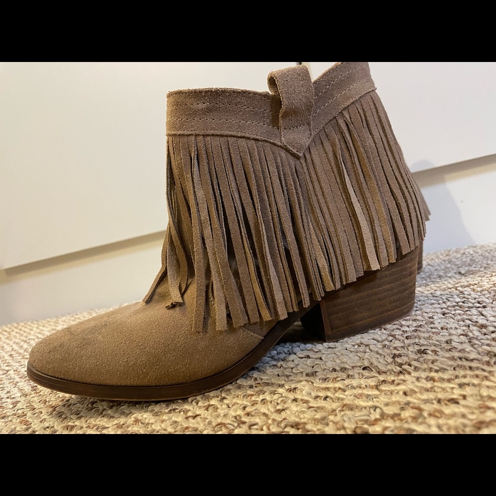 Brown fringe booties with small heel. Size 9.